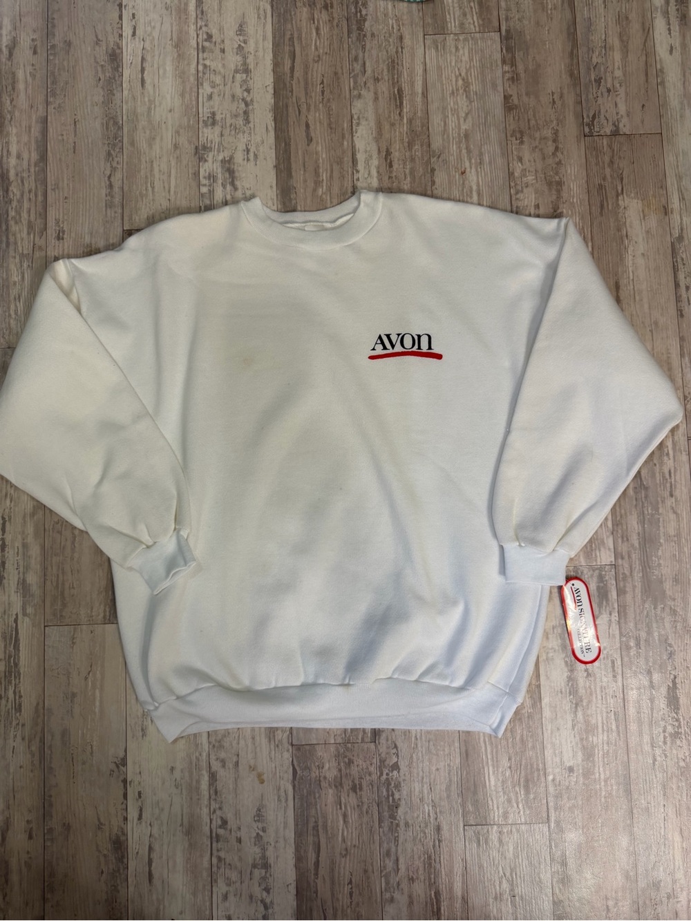 Vintage 1990 Avon White Crewneck Sweatshirt with Red Underline Logo